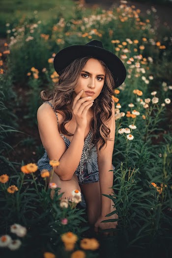 Woman Wearing Black Hat