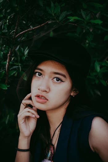 Woman Wearing Black Hat