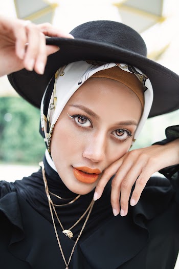Woman Wearing Black Hat