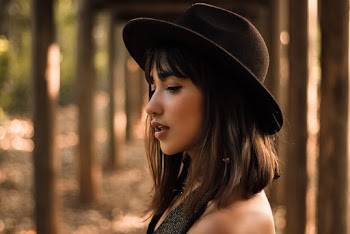 Woman Wearing Black Hat