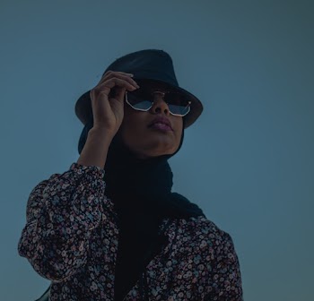 Woman Wearing Black Hat
