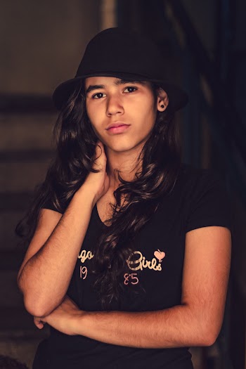 Woman Wearing Black Hat and Black Shirt