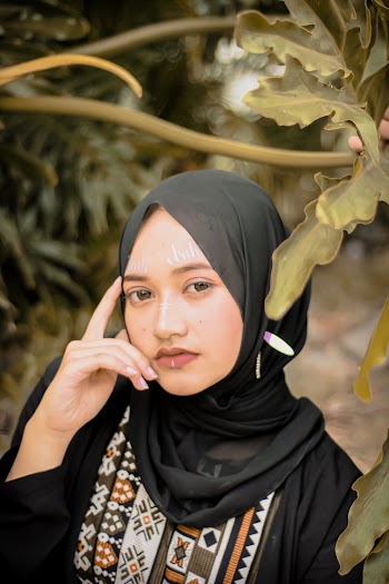 Woman Wearing Black Hijab Taking Selfie