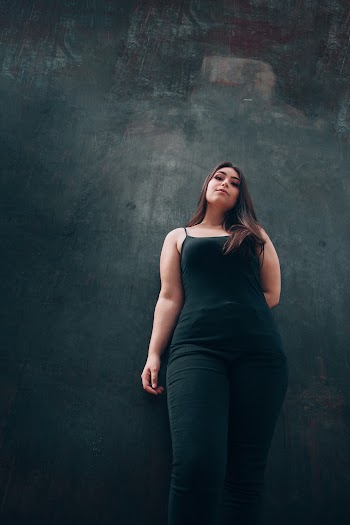 Woman Wearing Black Jumpsuit