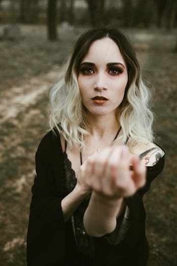 woman wearing black lace floral dress
