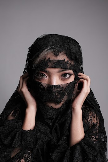 Woman Wearing Black Lace Hijab