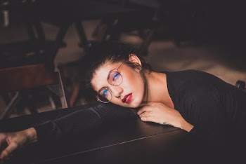 Woman Wearing Black Long Sleeve Shirt and Eyeglasses