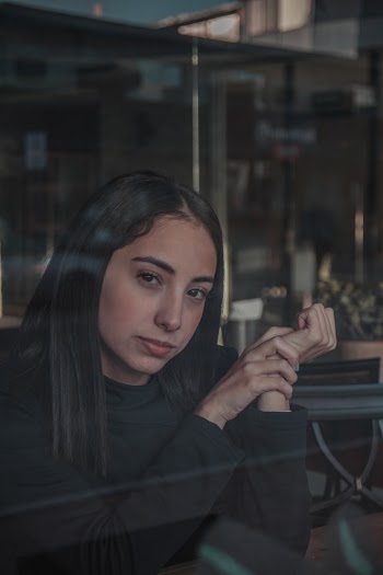 Woman Wearing Black Long-sleeved Sweatshirt