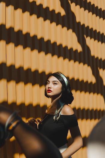 Woman Wearing Black Off-shoulder and Grey Head Band