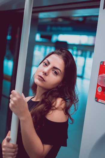 Woman Wearing Black Off Shoulder Blouse