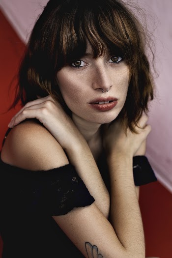 Woman Wearing Black Off-shoulder Dress