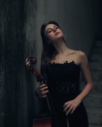Woman Wearing Black Off-shoulder Dress
