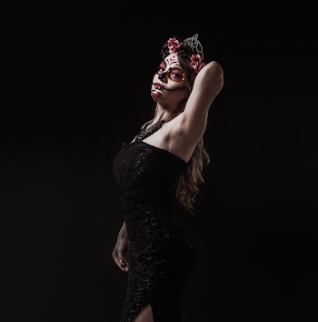 Woman Wearing Black Off-shoulder Dress With Skeletal Makeup