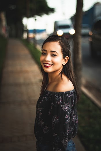 Woman Wearing Black Off-shoulder Top