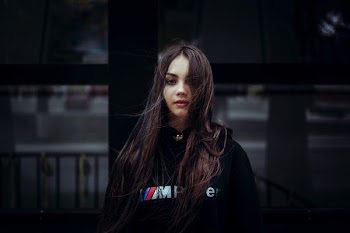 woman wearing black pullover hoodie