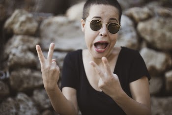 Woman Wearing Black Scoop-neck Blouse