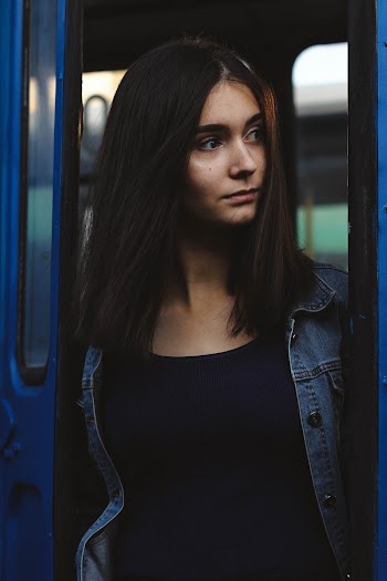 Woman Wearing Black Scoop-Neck Shirt