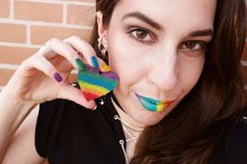 Woman Wearing Black Shirt Holds Striped Heart Decor