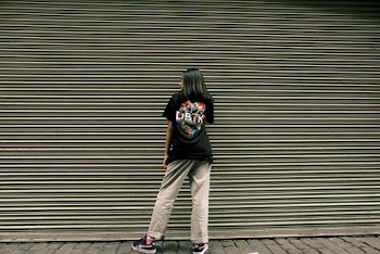 Woman Wearing Black Shirt Showing Back