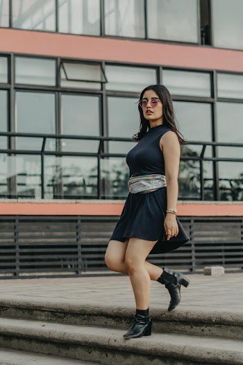 Woman Wearing Black Sleeveless Dress