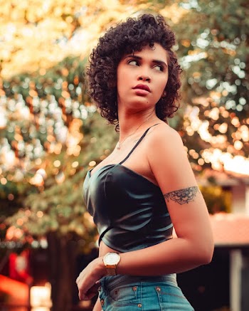 Woman Wearing Black Spaghetti-strap Crop-top