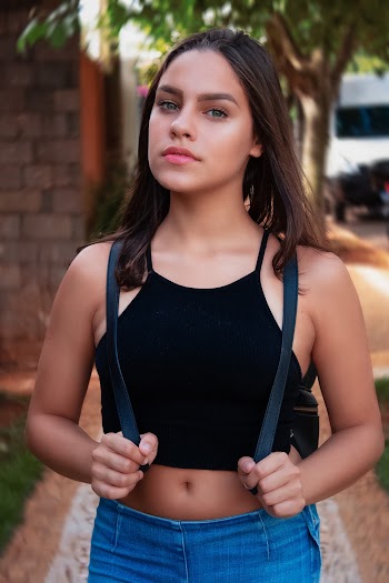 Woman Wearing Black Spaghetti Strap Crop Top