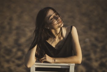 Woman Wearing Black Spaghetti Strap Dress