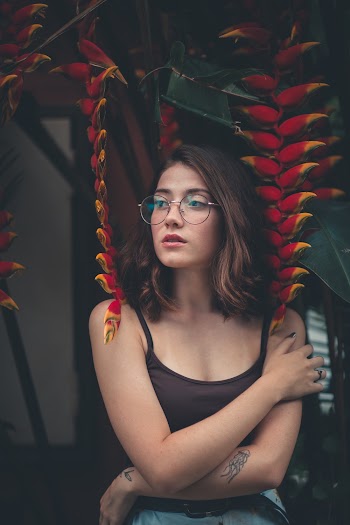 Woman Wearing Black Spaghetti-strap Tank Top