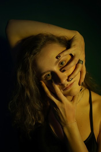 Woman Wearing Black Spaghetti-strap Top