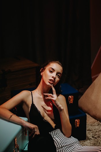 Woman Wearing Black Spaghetti Strap Top