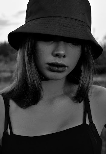 Woman Wearing Black Spaghetti Strap Top