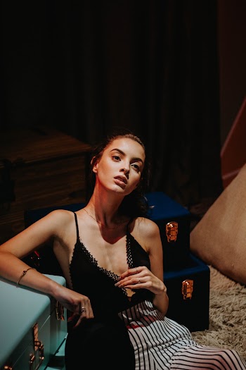 Woman Wearing Black Spaghetti Strap Top
