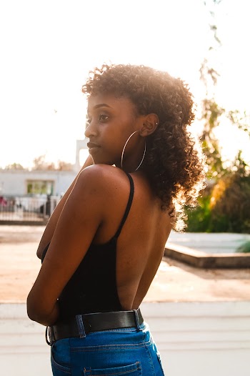 Woman Wearing Black Spaghetti Strap Top