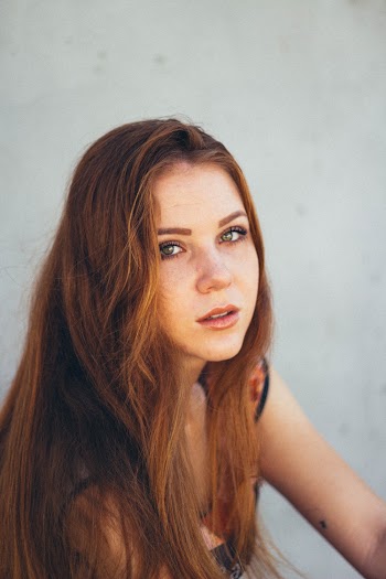 Woman Wearing Black Spaghetti Strap Tops
