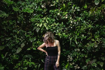Woman Wearing Black Strap Top