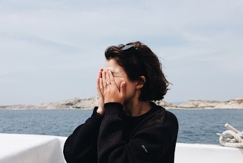 Woman Wearing Black Sweater