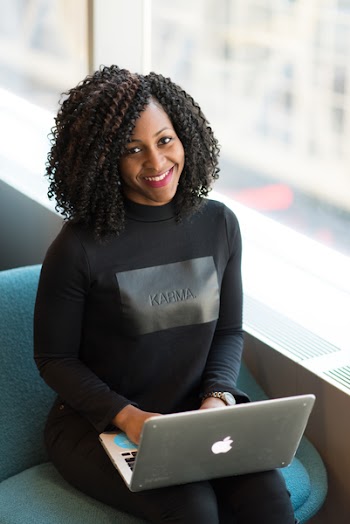 Woman Wearing Black Sweatshirt Using Silver Macbook
