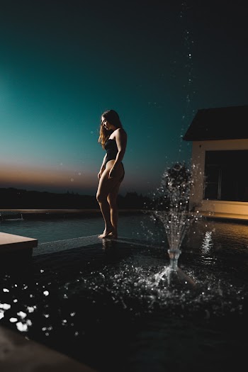 Woman Wearing Black Swimsuit