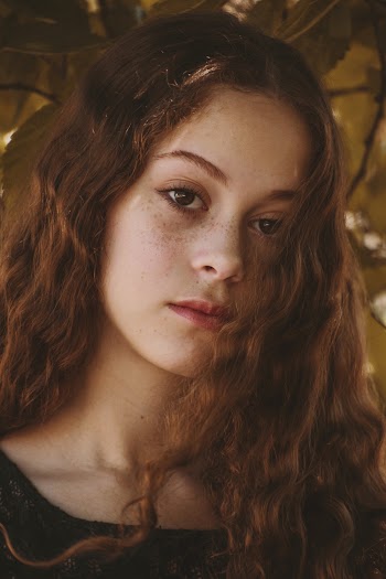 Woman Wearing Black Top