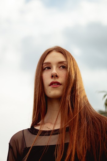 Woman Wearing Black Top
