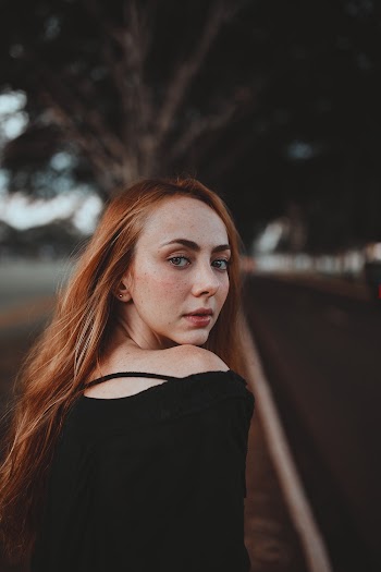 Woman Wearing Black Top