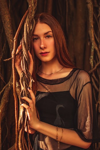 Woman Wearing Black Top