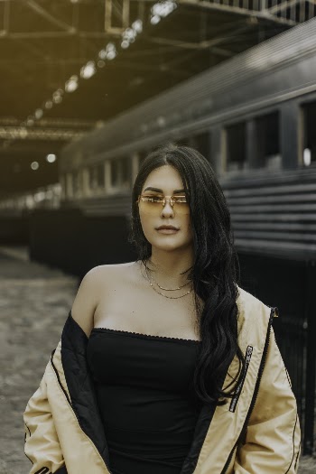 Woman Wearing Black Top and Jacket