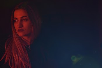 Woman Wearing Black Top during Nighttime