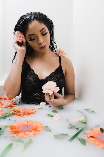 Woman Wearing Black Top in Bathtub