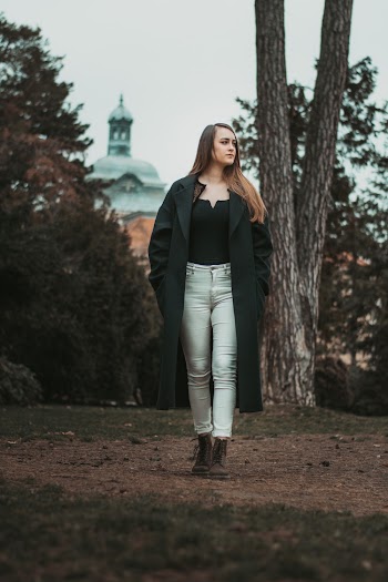 Woman Wearing Black Trench Coat