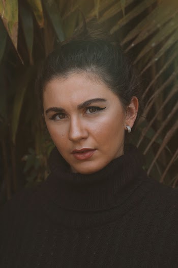 Woman Wearing Black Turtleneck Top
