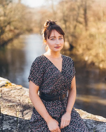 Woman Wearing Black V-neck Dress