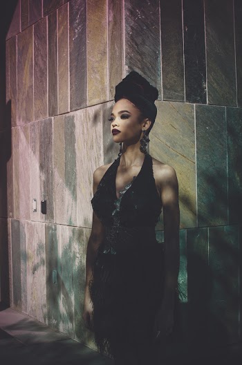 Woman Wearing Black V-neck Tank Dress