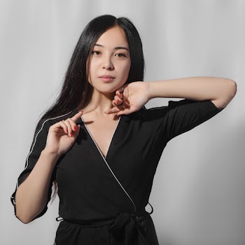 Woman Wearing Black V-neck Top